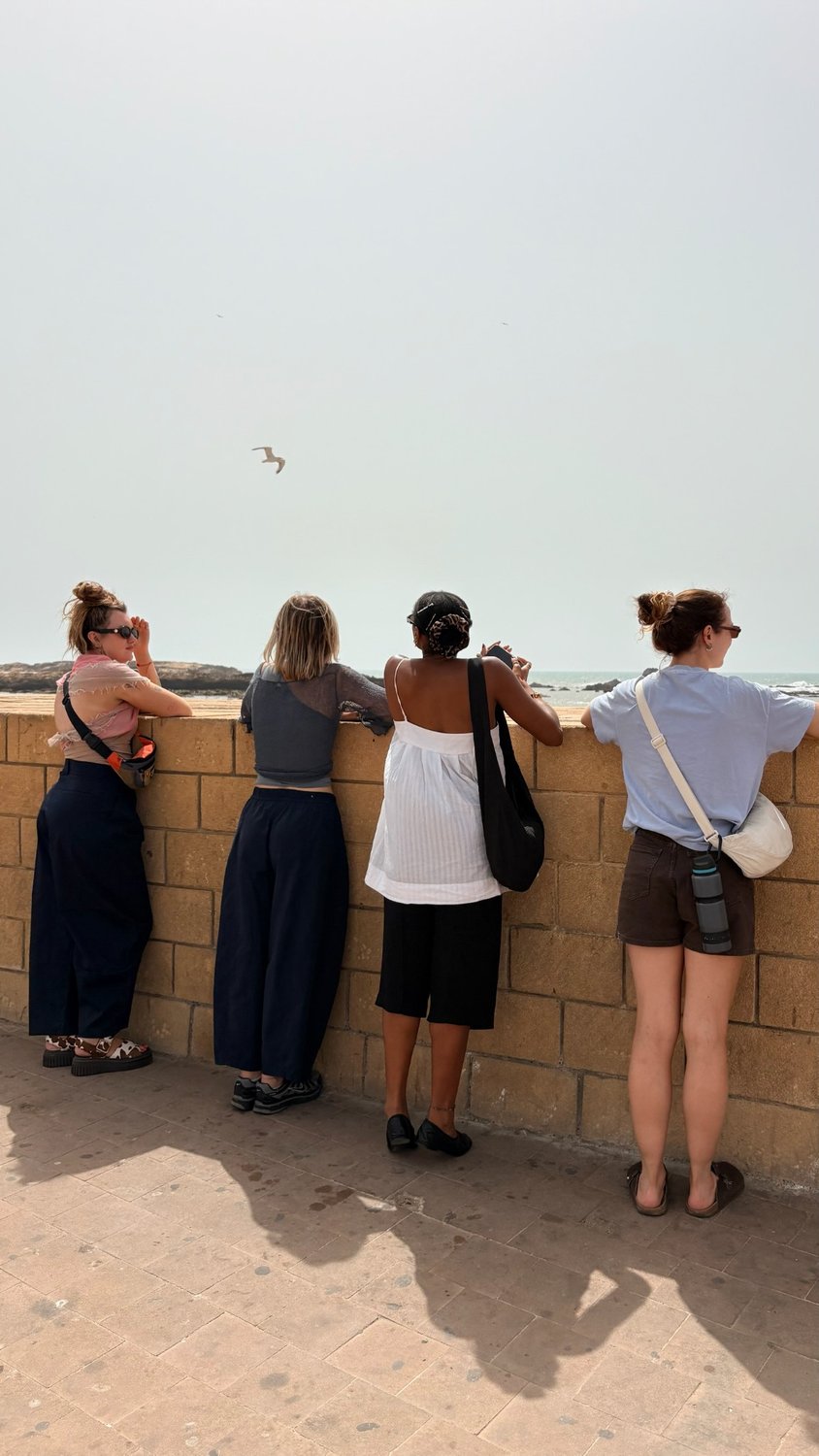 Casa Colectiva guests taking in the sea view in Essaouira.