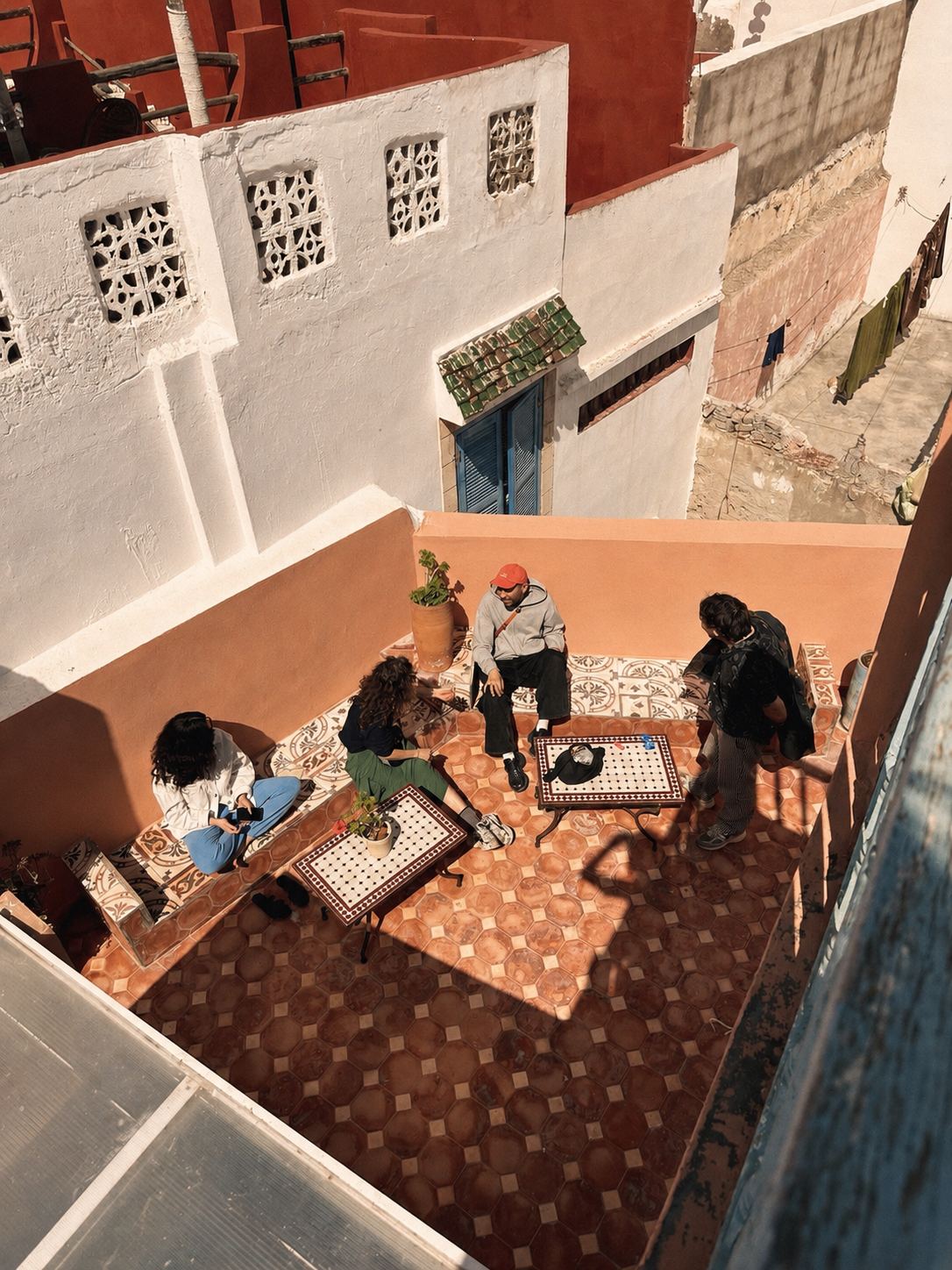 Casa Colectiva group gathered on a riad rooftop.