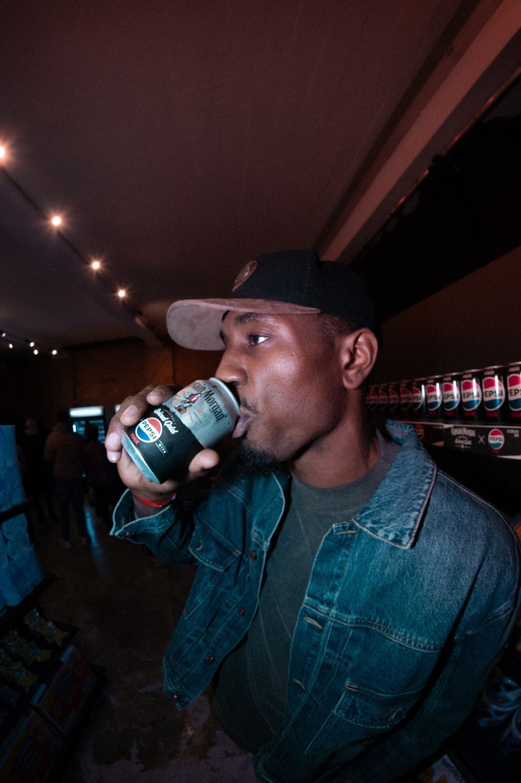 Guest sampling Captain Morgan and Pepsi Max at The Mixer.